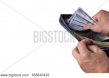 Close Up View Of Wallet With Dollar Banknotes In Man's Hands. Sweden.