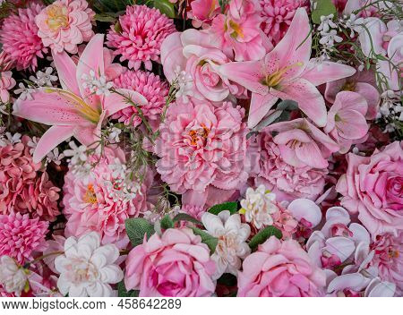 Big Bouquet Of Flowers In A Vase On A Gray Wall Background