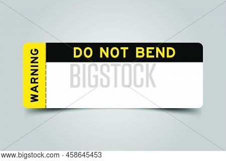 Yellow And Black Color Ticket With Word Warning And Do Not Bend And Have White Copy Psace On Gray Ba