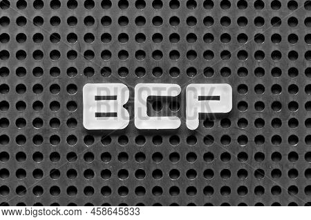 White Alphabet Letter In Word Bcp (abbreviation Business Continuity Plan) On Black Pegboard Backgrou