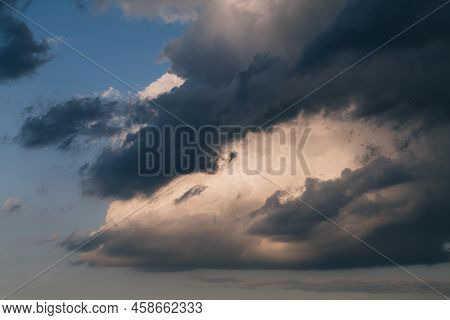 Beautiful Evening Sky With Multi-colored Bright Clouds. Rain Clouds At Sunset