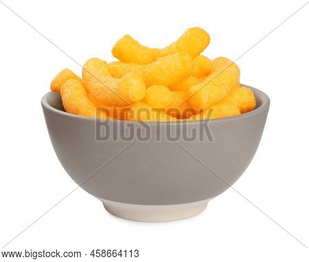 Many Tasty Cheesy Corn Puffs In Bowl Isolated On White
