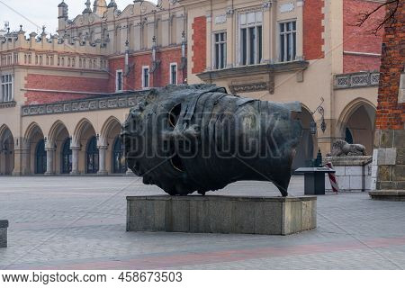 Krakow, Poland - 13 March, 2022: Eros Bendato Head Statue Sculpture Of Krakow Old Town Main Market S
