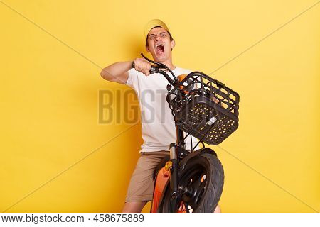 Indoor Shot Of Man Wearing Cap And T Shirt Riding On Electric E Scooter, Collision Accident, Funny M