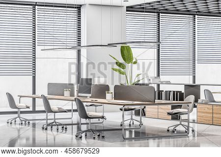 Modern Office Interior With Blinds, Panoramic City View, Furniture And Equipment. Workplace Concept.