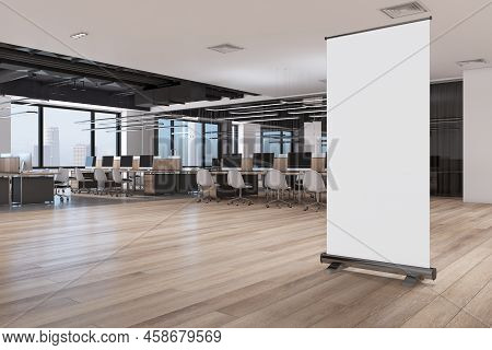 Modern Spacious Wooden And Concrete Coworking Office Interior With Empty White Roll Up Poster, Windo