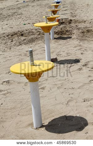 Umbrella Stand On The Beach