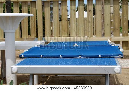 Deck Chairs On The Beach