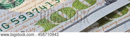 American Banknotes Of One Hundred Dollars. Fragment Of Bills Close-up. New Sample Money. Focus On Th