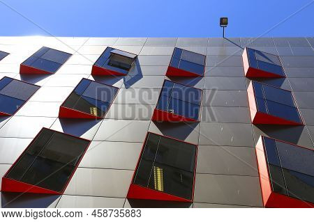 Rectilinear And Geometric Facade With Glass Windows Of The Town Hall Of Cartagena, Spain