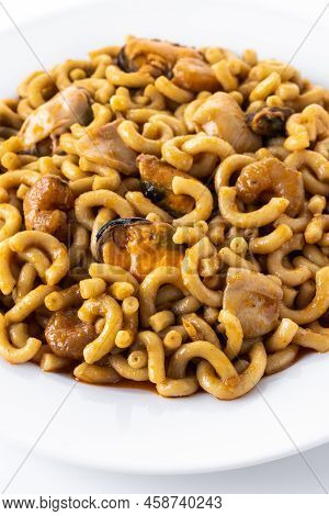Traditional Spanish Fideua. Noodle Paella Isolated On White Background. Close Up