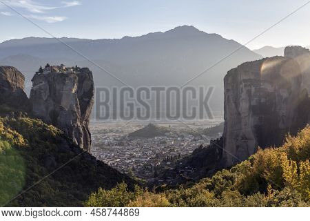 The Huge Rock Pillars Formation Of Meteora Over The Kalampaka Town During Sunset, Beside The Pindos 
