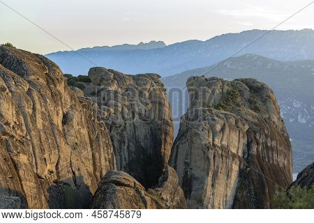 The Conglomerate Formation Of Meteora During Sunset, Beside The Pindos Mountains. Central Greece