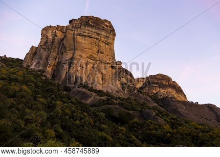 The Conglomerate Formation Of Meteora During Sunset, Beside The Pindos Mountains. Central Greece