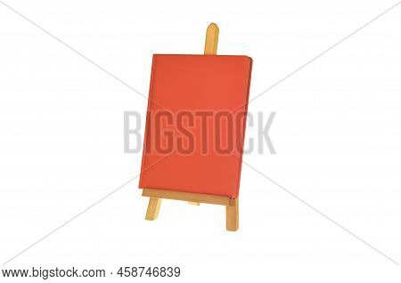 Orange Book On A Stand  Isolated On White