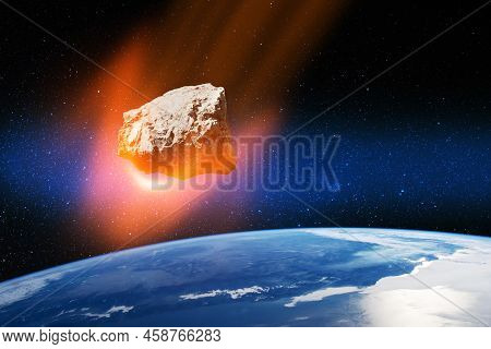 Planet Earth And Big Asteroid In The Space. Potentially Hazardous Asteroids. Asteroid In Outer Space