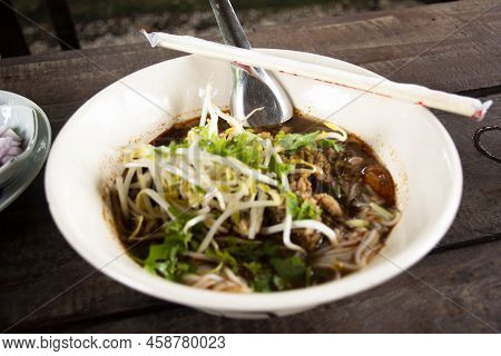 Local Traditional Thai Food Kanom Jeen Nam Ngeo Or Noodles Rice Vermicelli With Northern Thai Curry