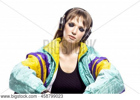 Dreaming Relaxed Winsome Caucasian Female Athlete Sportwoman In Fitness Sexy Outfit Wearing Wireless