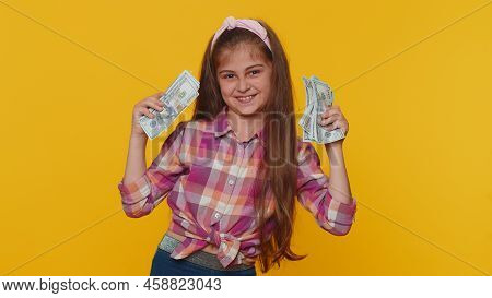 Successful Rich Preteen Child Girl Kid Holding Money Cash Cheering Up With High Profits, Lottery Gam