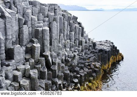 Tall And Gray Basalt Columns - Northern Coast Of Iceland In Europe