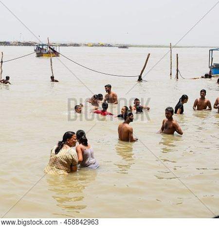 Garh Mukteshwar, Uttar Pradesh, India - June 11 2022 - People Are Taking Holy Dip On The Occasion Of