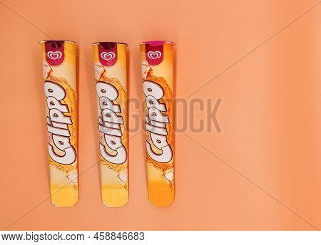 Bologna - Italy - July 6, 2022: Algida Calippo Icicle. Italian Ice Cream Isolated On Orange Backgrou