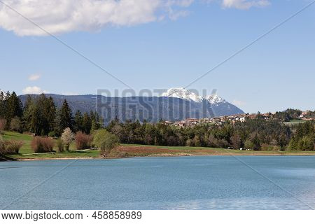 Panorama Of Lake Coredo (lago Di Coredo), Nearby Mountains With Snowy Peaks, Coniferous Forest, Flow
