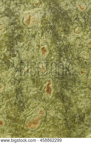 Spinach Flavored Wheat Tortilla Wraps. Spanish Or Mexican Circular Unleavened Flatbread From Wheat F