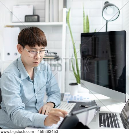 Professional development programmers are using tablet to test the functionality of their application