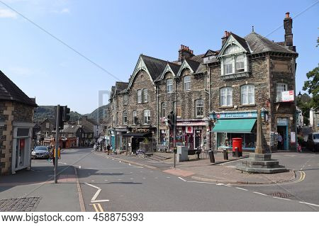Ambleside, England, 18 July 2022: View Of Ambleside Post Office And Town Centre Shops On Rydal Road 
