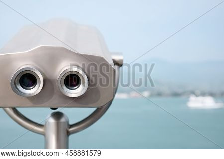 Metal Tower Viewer Installed Near Sea, Space For Text. Mounted Binoculars