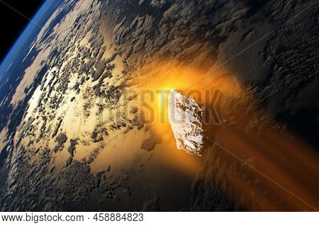Planet Earth And Big Asteroid In The Space. Potentially Hazardous Asteroids. Asteroid In Outer Space