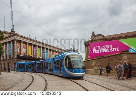 Birmingham, Uk - July 28, 2022.  A West Midlands Metro Tram Travelling Along Tracks At Victoria Squa