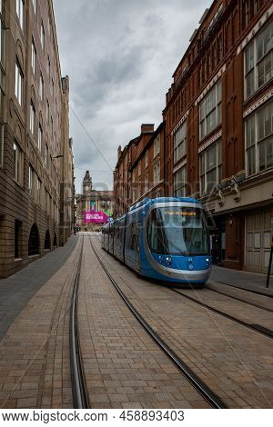 Birmingham, Uk - July 28, 2022.  A West Midlands Metro Tram Travelling Along Tracks At Victoria Squa