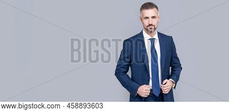 Mature Ambitious Man Businessman In Businesslike Suit Has Grizzled Hair, Business Executive. Man Fac