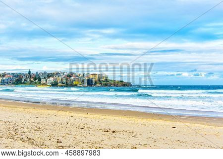 Beautiful Bondi Beach With Colorful Houses On The Pacific Ocean Coastline Of Sydney, Australia. The 