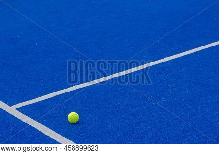 A Ball On A Blue Paddle Tennis Court, Racket Sports Concept