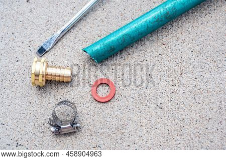 New Garden Hose Replacement Connection And Pipe Mender To Tighten And Secure Repair.