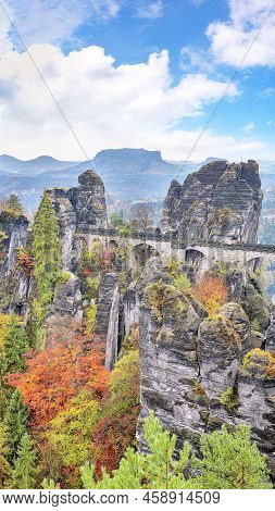 Picturesque Autumn Landscape In Saxon Switzerland National Park And  Bastei Bridge.   Location: Lohm