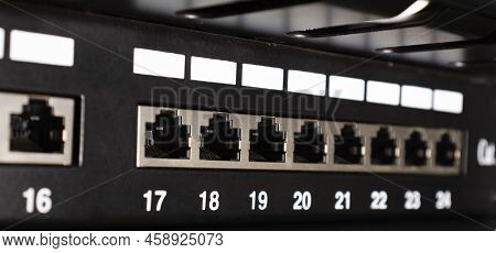 Closeup View Of Patch Panel Ethernet Ports. Network Engineering Concept