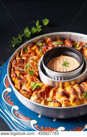 Food For Party Concept Spot Focus Organic Homemade Pull Apart Pizza Ring On Black Background With Co