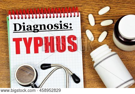 Typhus Is The Inscription Of A Medical Diagnosis, Against The Background Of Medications And A Stetho