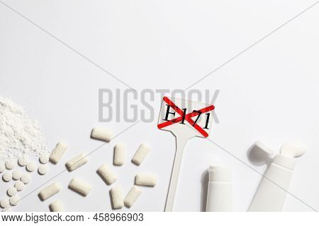 Titanium Dioxide, E171, Dangerous Additive Concept. Gum, Pills, Toothpaste, Powder And Sign With E17