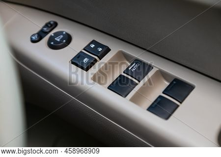 Novosibirsk, Russia -  July 29, 2022:   Honda N-box, Car Door Interior Armrest With Window Control P