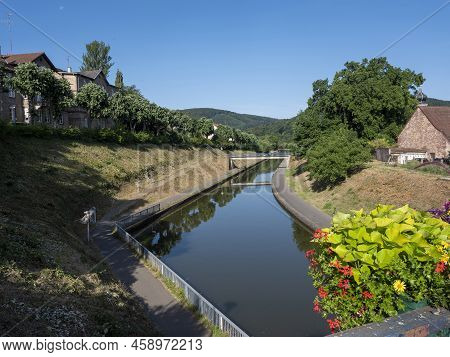 Marne Rhine Canal In French Town Of Saverne Under Blue Summer Sky In French Vosges Area