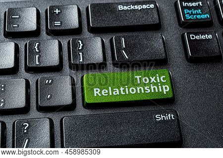 Toxic Relationship Words On The Green Enter Key Of A Desktop Computer Keyboard. Concept Of Unsupport