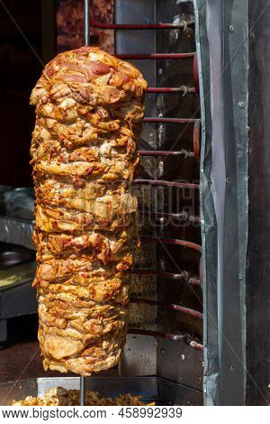 Close Up Shot Of Stacked Meat Roasting