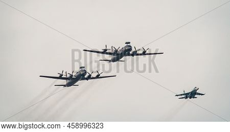 Russia, St. Petersburg, 28 July 2022: Military Aircraft And Helicopters Of The Air Force Fly On The 