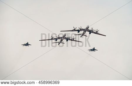 Russia, St. Petersburg, 28 July 2022: Military Aircraft And Helicopters Of The Air Force Fly On The 