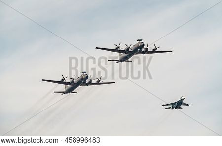 Russia, St. Petersburg, 28 July 2022: Military Aircraft And Helicopters Of The Air Force Fly On The 